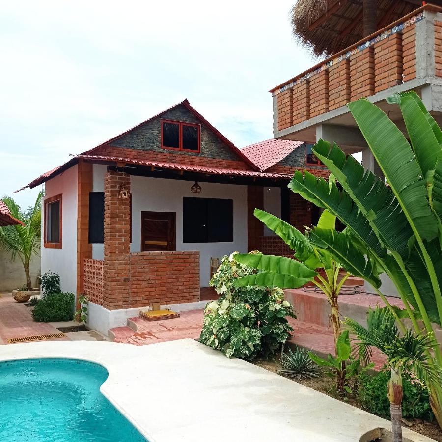 Bungalows Y Cabanas, Las Barracas De La Barra Malucano Exterior photo
